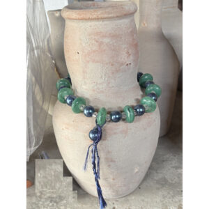 clay vase with a necklace of natural stones olaria sb - raffia objects home decor