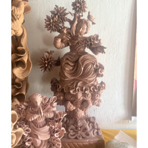 Handmade Catholic clay sculpture of Saint Francis of Assisi with tree and birds by Olaria RMG, featuring artisan religious craftsmanship and spiritual Christian decor. raffia objects home decor